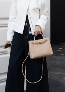 Borsa a mano in pelle intrecciata da donna, elegante borsa a tracolla con nodo.
