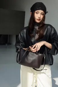 Genuine leather women handbag minimalist tote stylish shoulder bag for daily commuting and office.