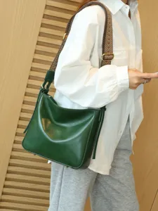 Retro minimalist genuine leather women shoulder bag, casual crossbody bag with wide strap.