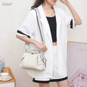 Genuine leather top-handle crossbody shoulder bag for women, versatile everyday commute bag.