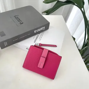 Pink leather short wallet for women, stylish contrast color compact purse with zipper.
