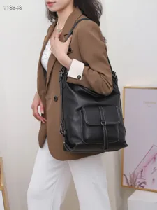 Sac à dos en cuir véritable pour femme, grand sac bandoulière en vachette avec poche avant.