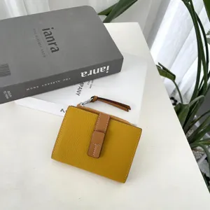 Stylish yellow short women wallet with brown color block design, large capacity and zipper.