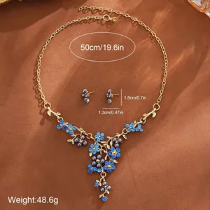 Detailed view of the exquisite blue crystal pearl floral necklace and matching earrings set.