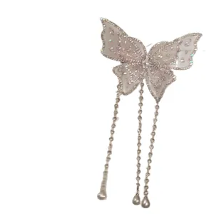 Zarte Netztuch Schmetterling Haarklammer mit glitzernden Strasssteinen und Perlen.