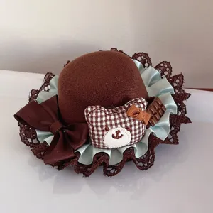 Chocolate brown Lolita mini hat with cute grid bear and chocolate accessory, perfect style.
