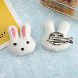 Cute plush bunny brooch hair clip dual use, soft white fabric with sweet pink ears detail.