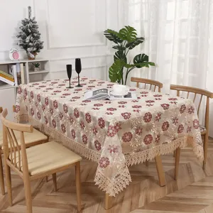 Pastoral mesh embroidered tablecloth with delicate floral pattern and elegant lace edge for dining table.