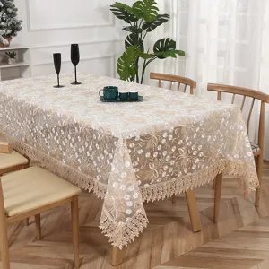 Elegant rectangular organza embroidered tablecloth with delicate lace trim for dining table.
