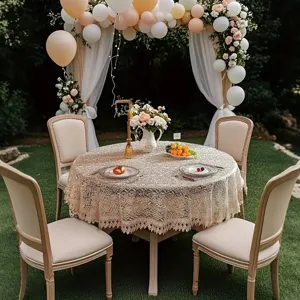 French vintage embroidered round tablecloth, exquisite hollow lace design for elegant dining decor.