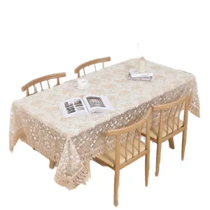 Elegant rectangular glass yarn embroidered tablecloth with lace border for dining table decor.