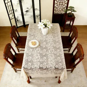Exquisite rectangular lace embroidered tablecloth in light coffee, ideal for table decor.