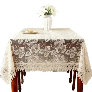 Elegant lace embroidered tablecloth, rectangular floral table cover for dining room decor.