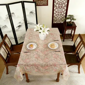 Elegant rectangular lace tablecloth with pink floral embroidery for home dining table.