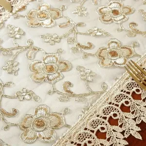 Detailed view of American country lace table runner with intricate floral embroidery and sequins.