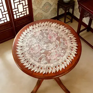 Exquisito mantel redondo de malla bordada con delicado diseño floral de encaje para el hogar.