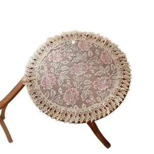 Mantel redondo de encaje bordado con delicado borde de encaje, diseño floral vintage para el hogar.