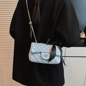 Chic quilted chain shoulder bag with bow, stylish light blue crossbody handbag for women
