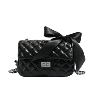 Black quilted chain crossbody bag with elegant satin bow luxury style small shoulder bag