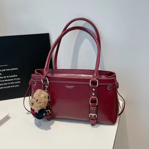 Burgundy leather shoulder bag, stylish underarm tote bag for women daily commute and work.