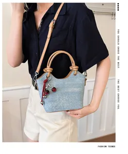 Trendy denim bucket shoulder bag casual crossbody handbag with cute cherry charm for daily women.