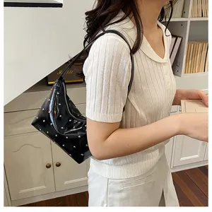 Black PU leather studded shoulder bag for women, stylish vintage casual axillary handbag.