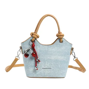 Casual denim bucket bag for women, stylish top-handle handbag with cute cherry pendant, new.