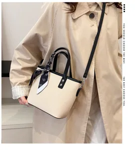 Trendy woven crossbody tote bag for women, chic small handbag with stylish scarf detail.
