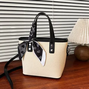 Chic straw woven tote bag for women, summer casual handbag with stylish scarf and shoulder strap.