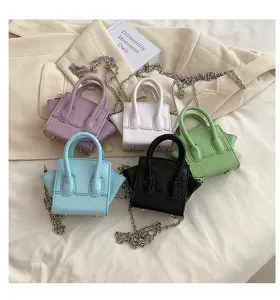 Fashion mini handbag with chain strap, stylish PU leather crossbody bag for daily wear.