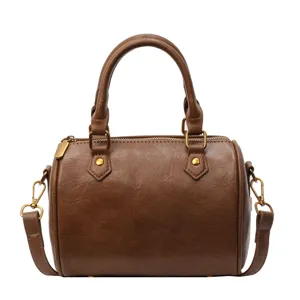Classic brown boston bag for women, minimalist PU leather handbag with shoulder strap.