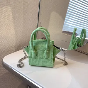 Fresh trendy mini handbag with snake pattern, chic tote crossbody bag with chain strap.