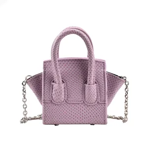 Chic purple mini handbag with snake texture, top handle and silver chain strap for women.