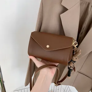 Women Brown Crossbody Bag Casual PU Leather Shoulder Bag with Cute Pendant Main View
