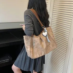 Korean style retro large capacity shoulder tote bag for women, casual commuting handbag.