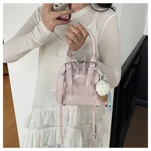 Chic pink small handbag and crossbody bag for women, elegant retro style daily shoulder bag.