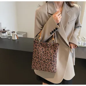 Leopard print tote bag with bamboo handle, vintage chic shoulder bag for women daily commute.