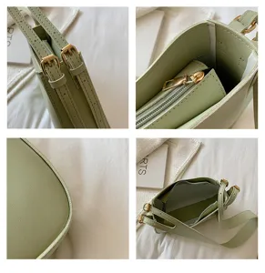 Detail view of light green women bucket bag showcasing adjustable shoulder straps and inner zip.