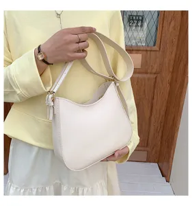 Minimalist solid color hobo shoulder bag for women, versatile PU leather crossbody bag daily commuting.