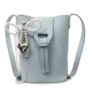 Light blue mini bucket bag for women, cute pearl heart pendant crossbody phone bag daily.