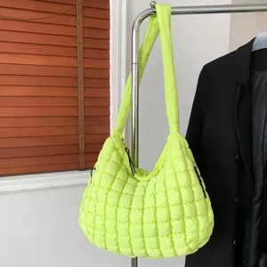 Neon green quilted puffer shoulder bag, stylish down cotton dumpling handbag for women daily.