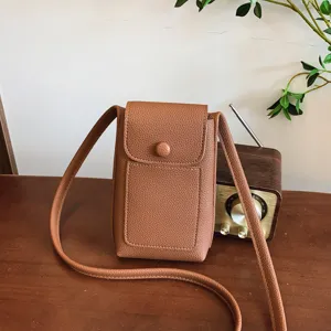 Brown leather crossbody phone bag for women, stylish small retro shoulder handbag daily use.