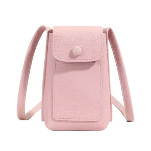 Pink soft leather crossbody phone bag for women, stylish mini shoulder bag with strap.