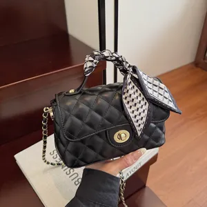 Black quilted chain shoulder bag for women, classic flap bag with chic handle scarf.
