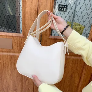 Simple white hobo bag for women, stylish PU leather shoulder and crossbody bag for daily commute.