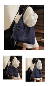 Detailed view of the large capacity soft fabric shoulder bag worn by model on indoor stairs.
