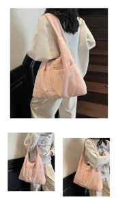 Large capacity pink quilted shoulder bag soft bucket cloth bag for daily commute and students.