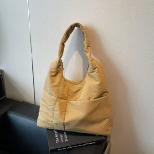 Large capacity quilted shoulder bag for women, casual soft commuter tote and everyday bag.