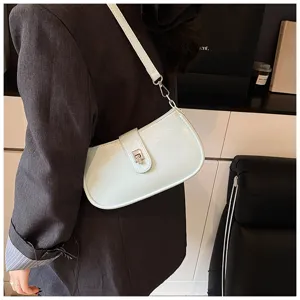 Stylish light blue underarm shoulder bag for women, trendy PU leather daily commuter handbag.