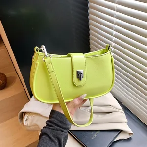 Stylish lime green underarm shoulder bag for women, trendy commuter PU leather handbag.